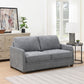 A gray upholstered loveseat sofa